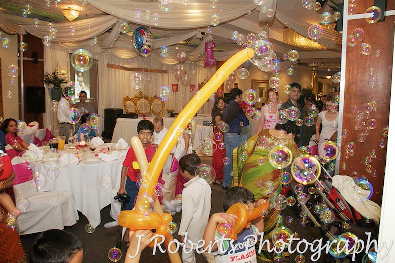 Bubble machine and little boys at birthday party - party photography sydney